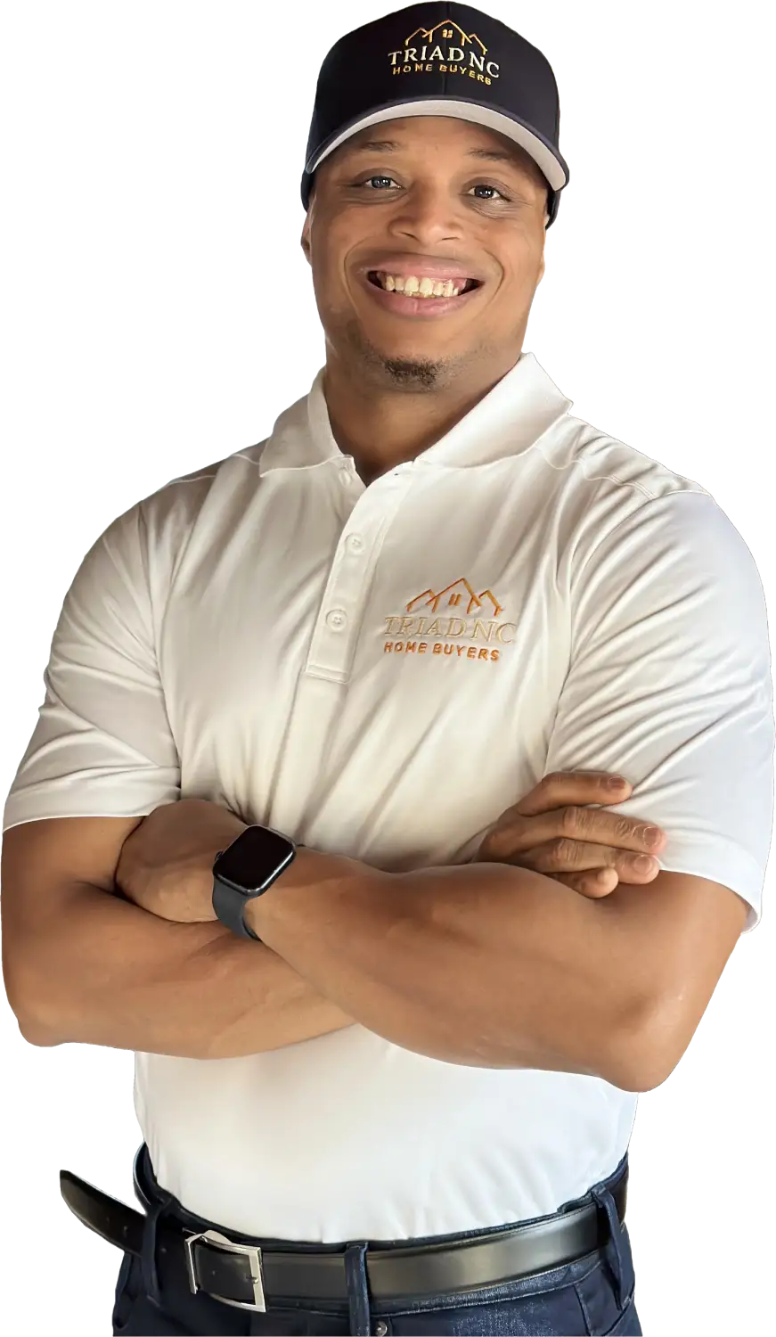 Mid-section view of a professional real estate buyer with arms crossed in a branded shirt.